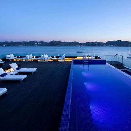 Altis Belem Hotel & Spa, A Member Of Design Hotels Lisboa Kültér fotó The rooftop pool at the Hotel Lone
